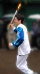 Tim Henman carrying the Olympic Flame Wimbledon 2004